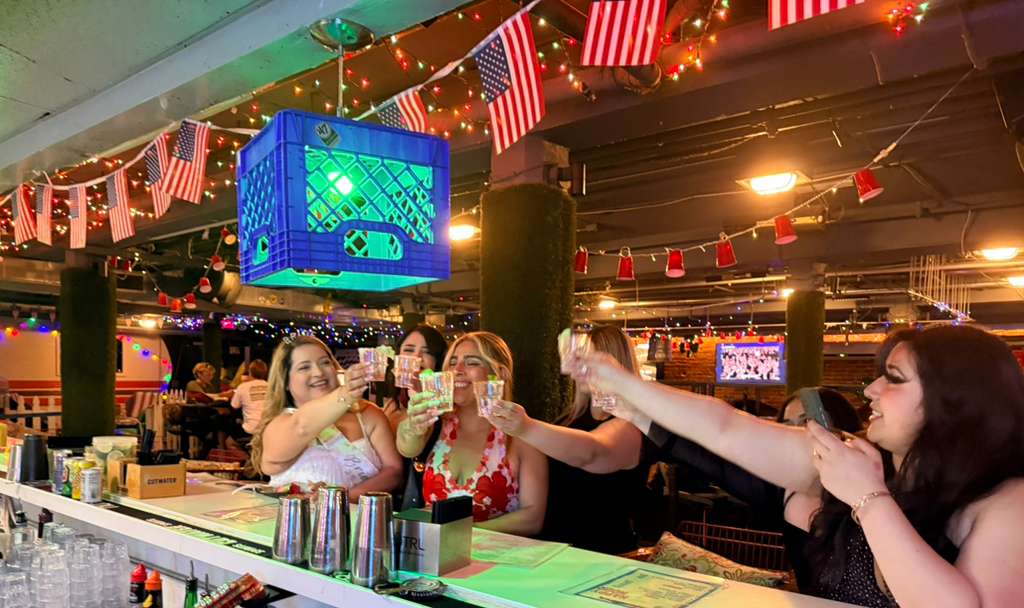 Bachelorette group celebrating in a private trailer room at an underground Gaslamp Quarter bar in San Diego